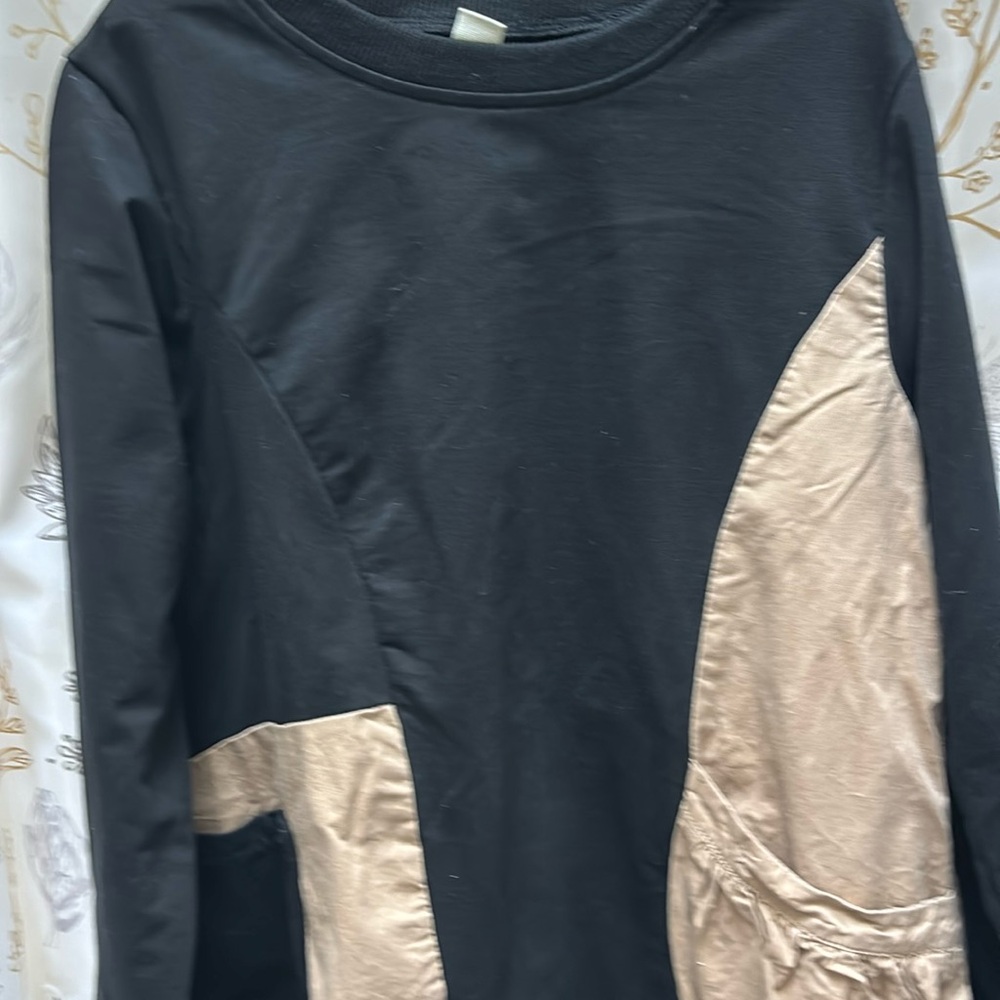 Girls size 12 tan and black dress with two pockets .a very different look ..🙂